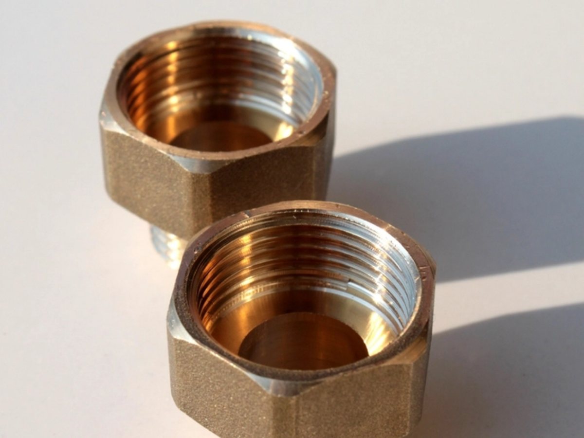 Threaded brass connectors (illustrative stock photograph)
