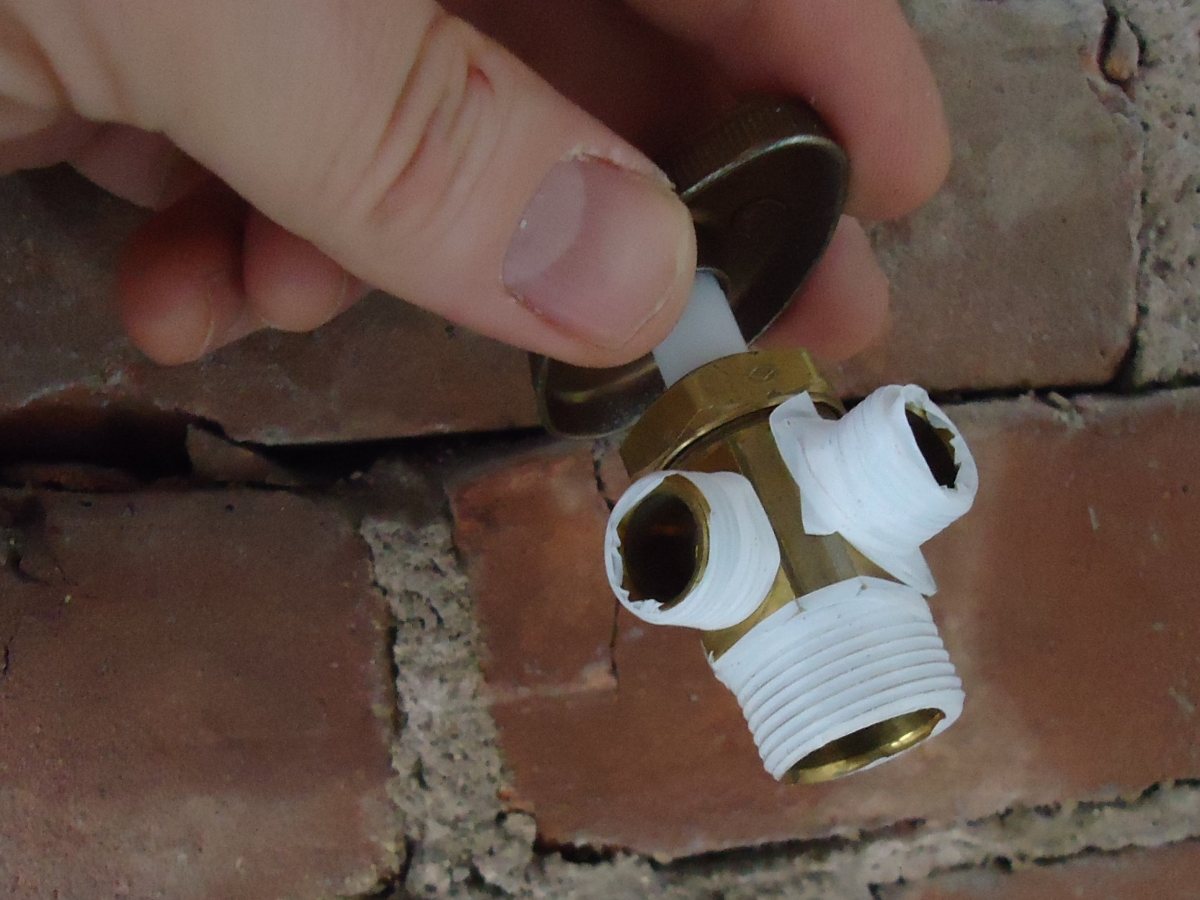 A stop valve being fitted (illustrative stock photograph)