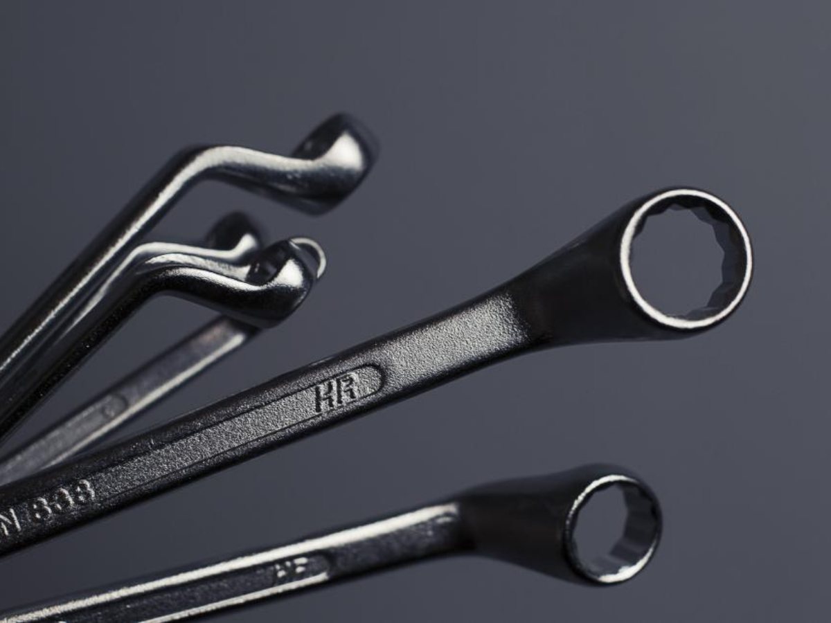 Spanners on a dark surface (illustrative stock photograph)