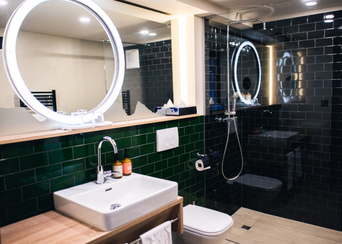 A finished bathroom with a basin and mirror (illustrative stock photograph)