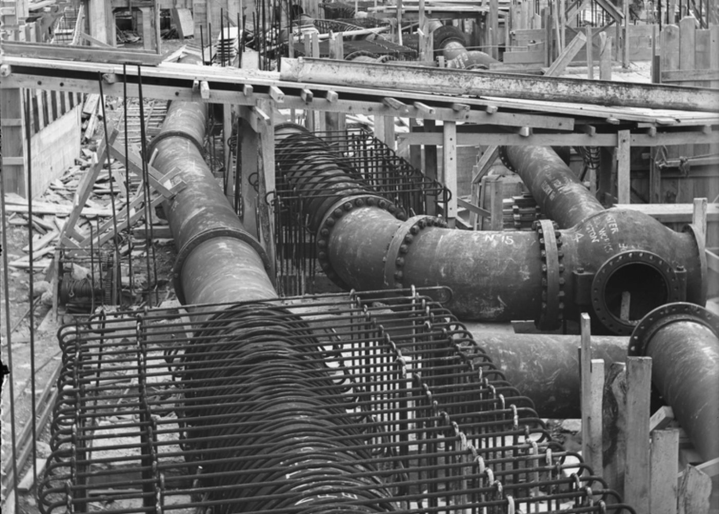 Pipework being installed on a construction site (illustrative stock photograph)